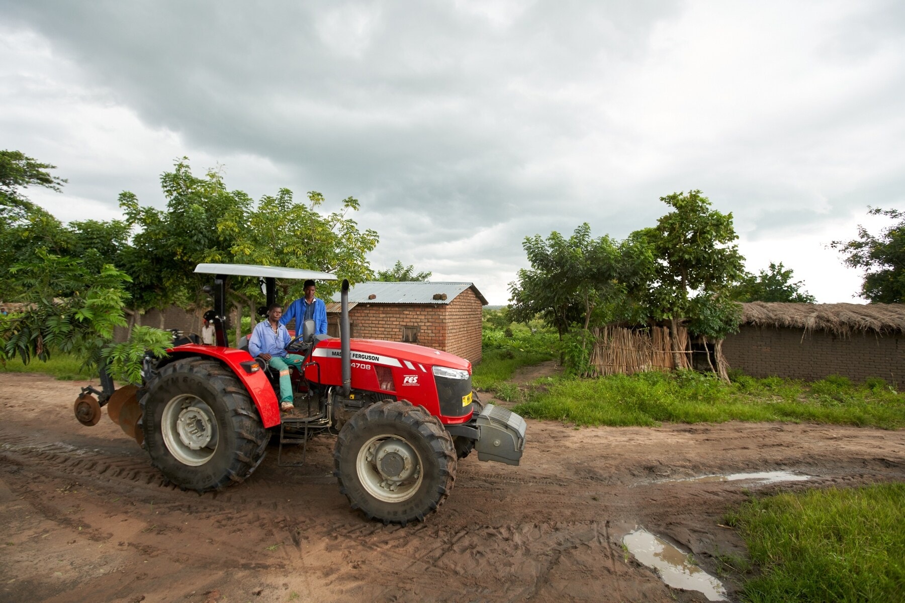 Two entrepreneurs providing field preparation services to farmers using tractors