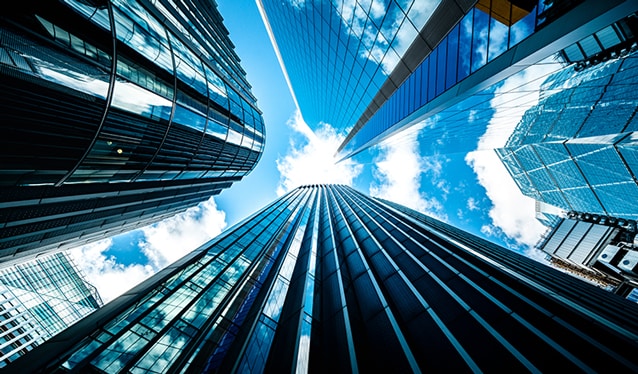 Looking up at London skyscrapers