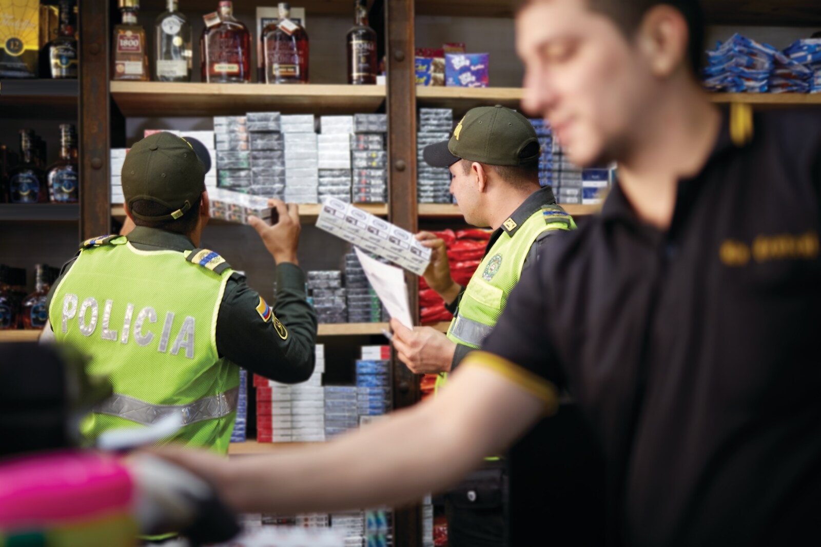 police-inspecting-cigarette-shop-colombia