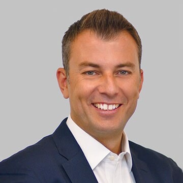 Vassilis-Gkatzelis-blue-headshot