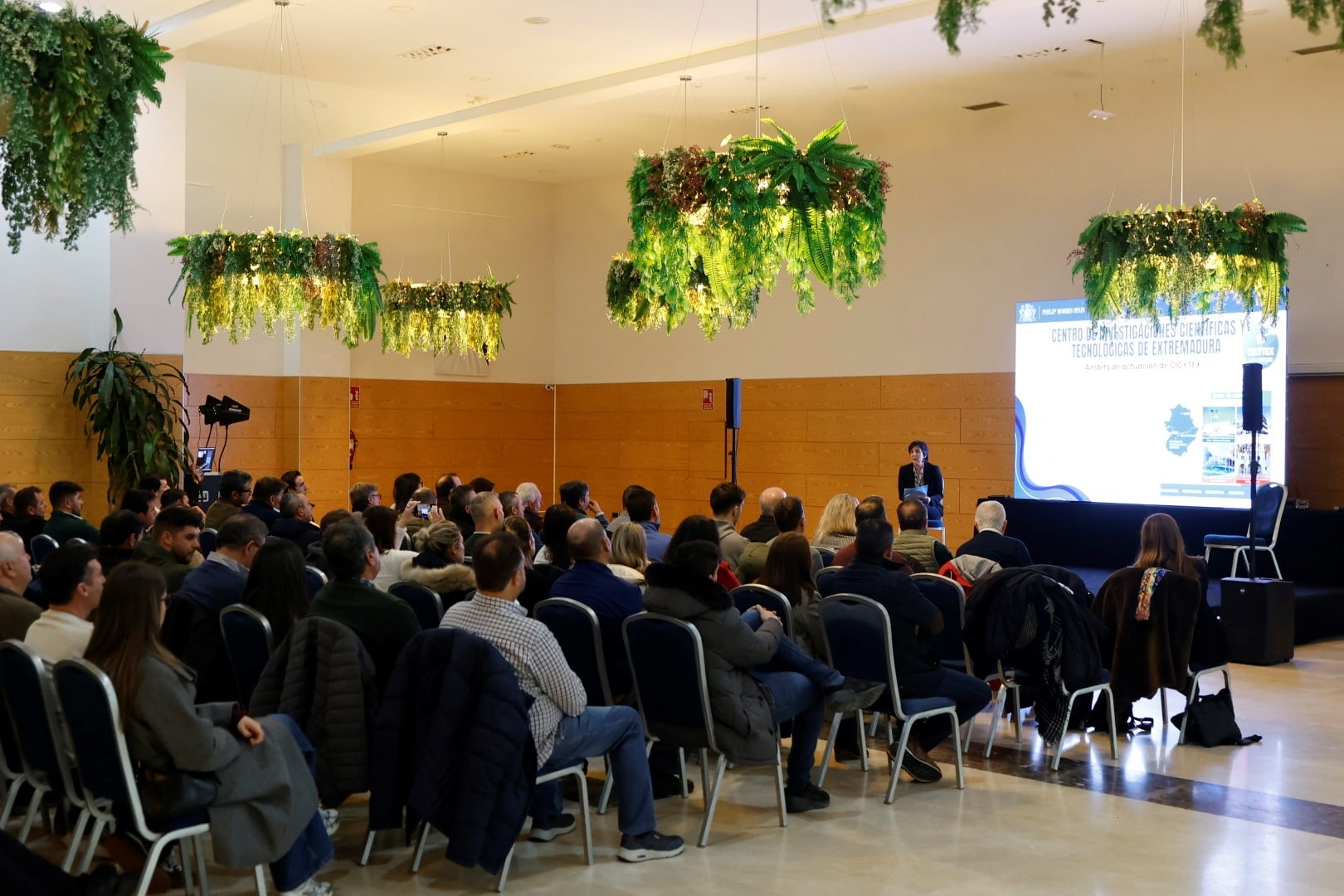 Audience attending a presentation about agricultural innovation and digitalization.
