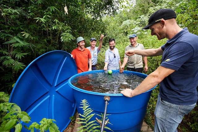 A group of men analyze spring water near the Suaçuí Pequeno River in southeastern Brazil.