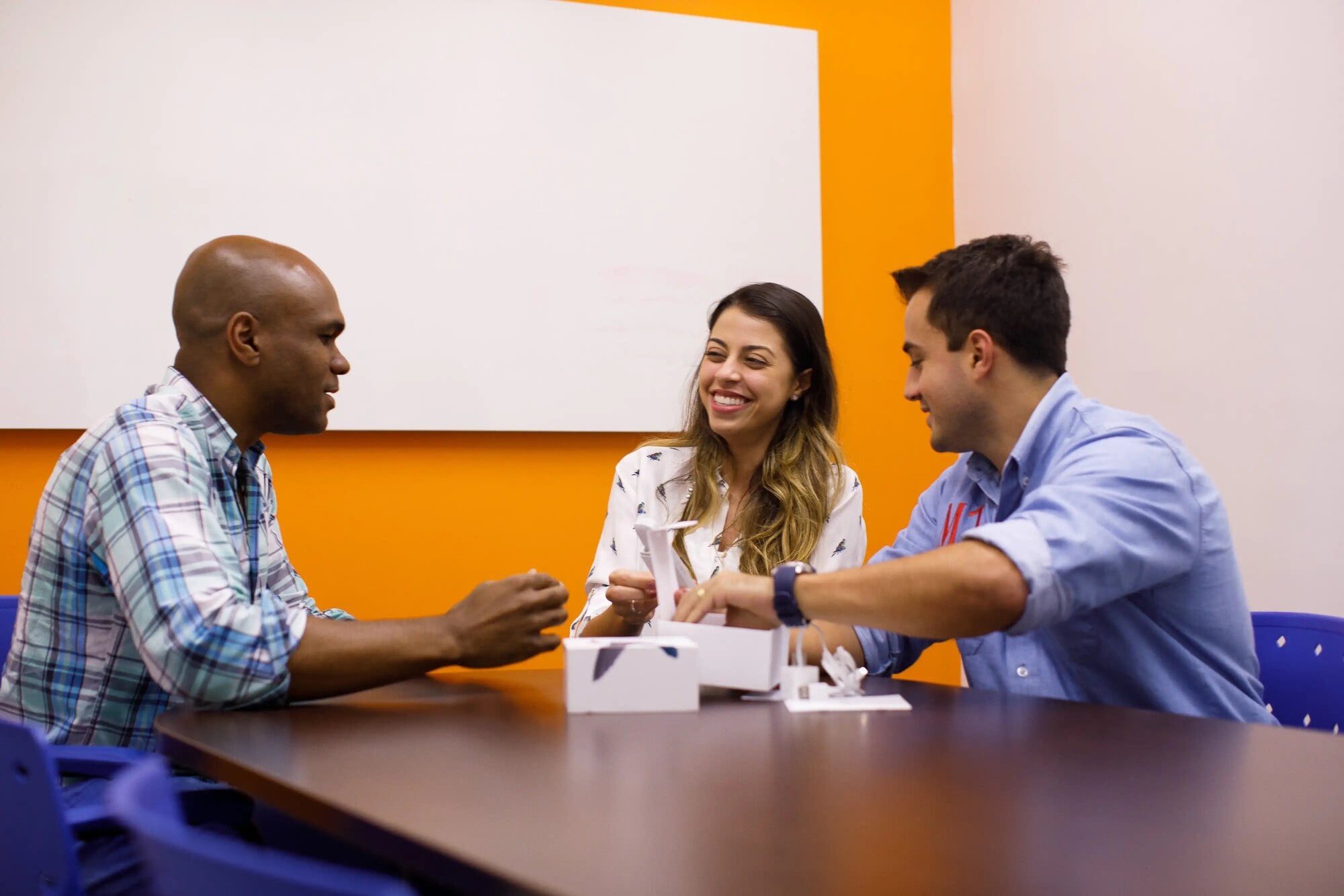 employees in an office at Philip Morris Brazil