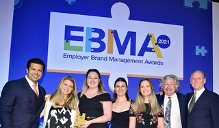 PMI team collecting award at EBMA Awards