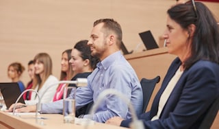 People sitting in a lecture room