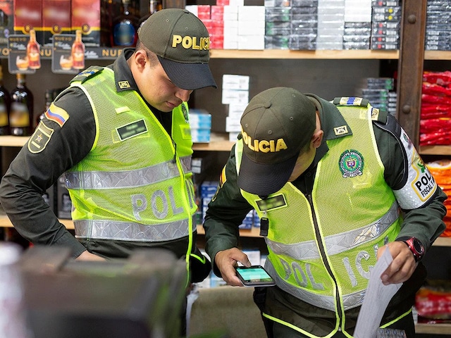 Two police officers in uniform.