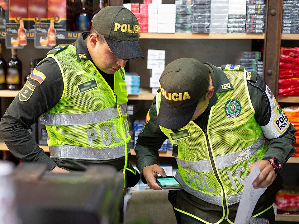 Two police officers in uniform.