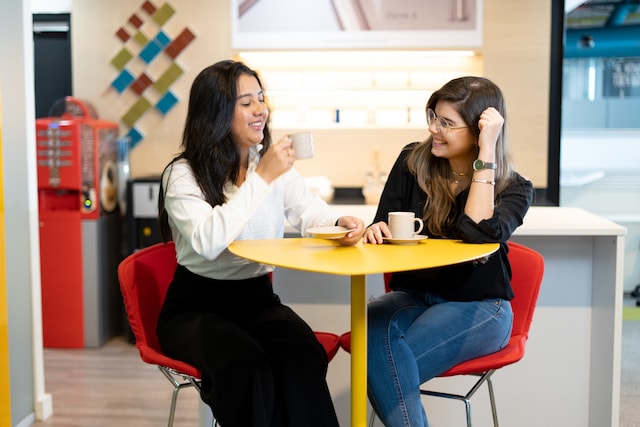 women drinking coffee banner