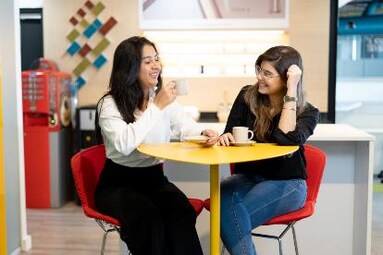 women drinking coffee banner