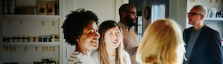 People chatting at a social gathering