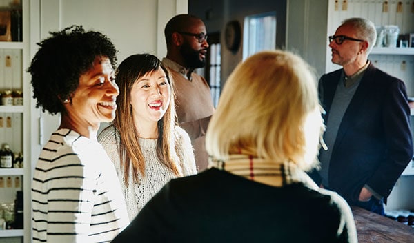 People chatting at a social gathering