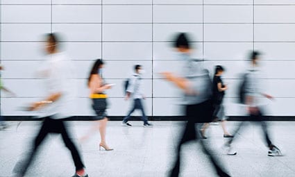 People walking against white background