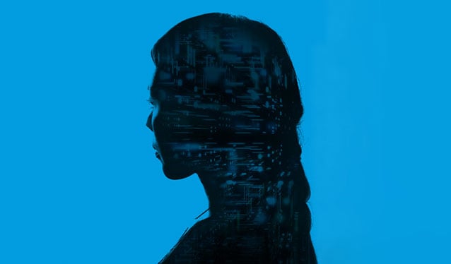 Silhouette of a woman against a blue background