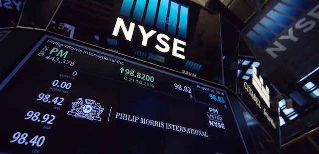 A screen showing the PMI stock price at the New York Stock Exchange.