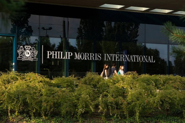 Employees outside the Philip Morris International Operations Center in Lausanne.