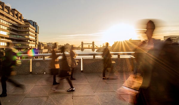 Commuters crossing London Bridge