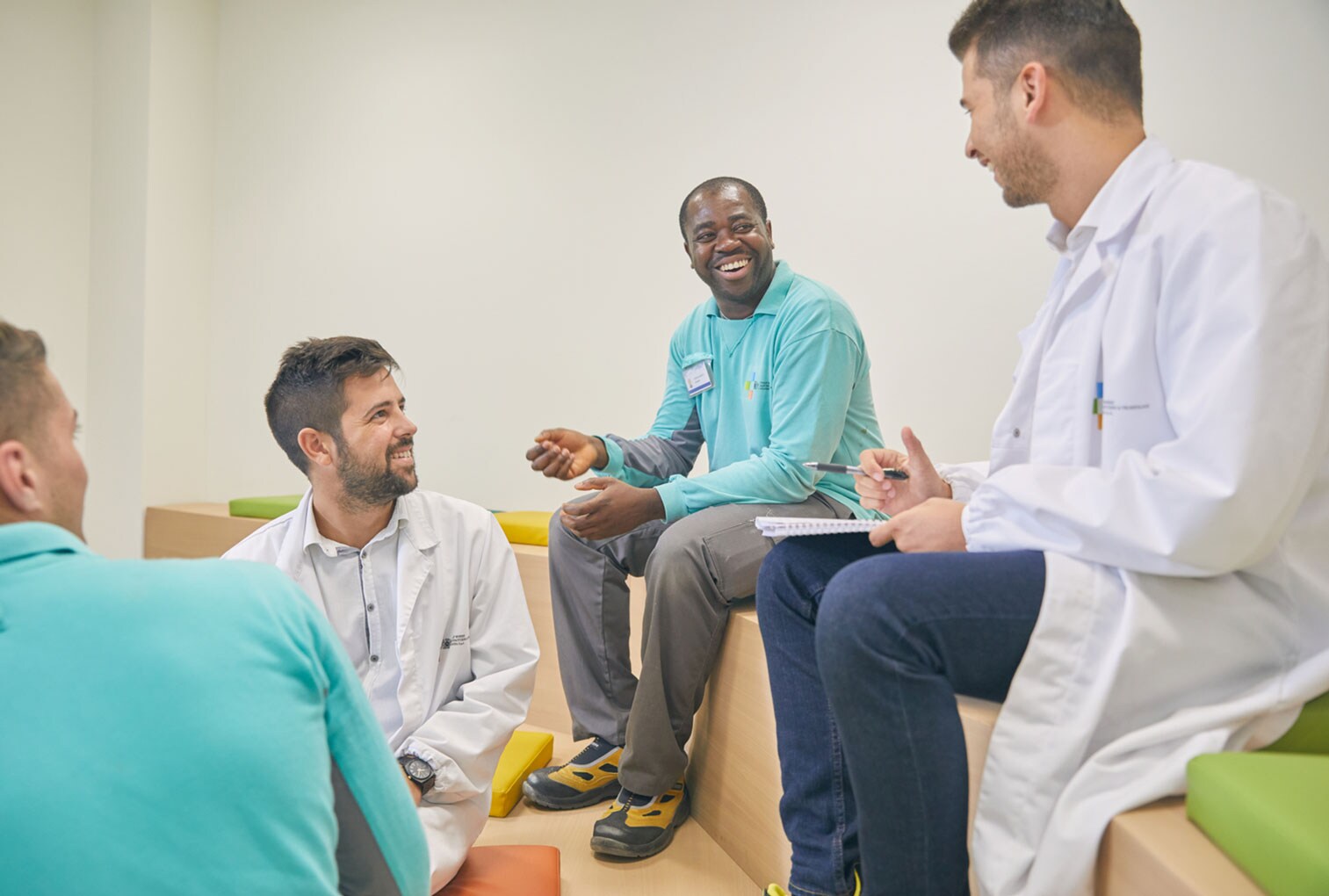 Colleagues chatting during a break