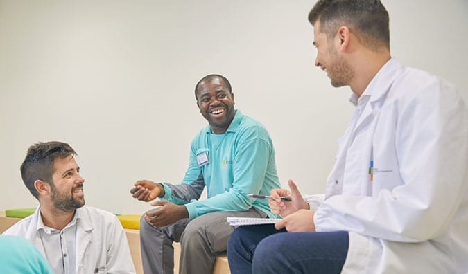 Colleagues chatting during a break