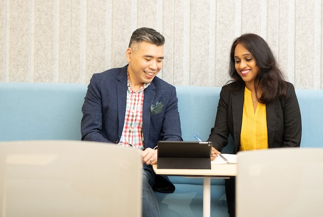 Male and female employees in an office