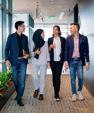 Employees talking in the office