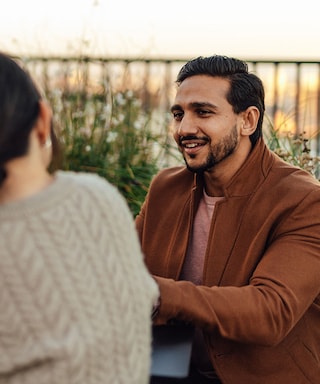 Work colleagues talking outside