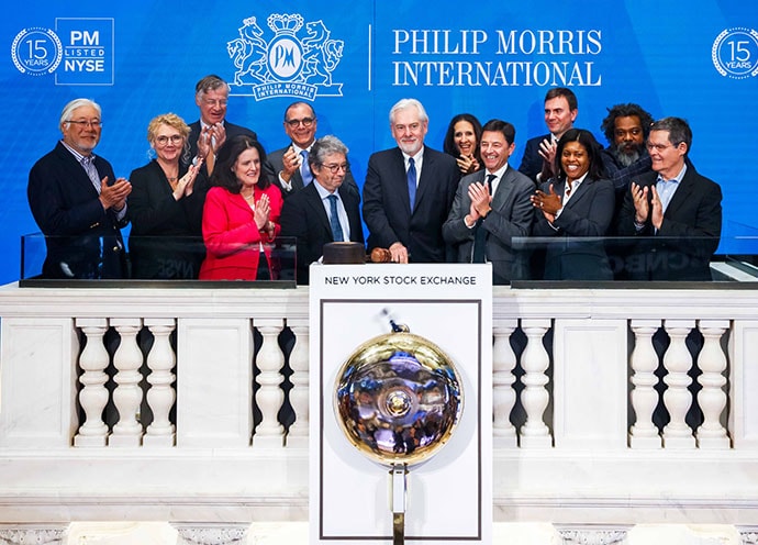 Philip Morris International board ringing the bell at the New York Stock Exchange