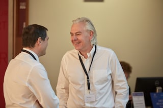 Jacek Olczak conference