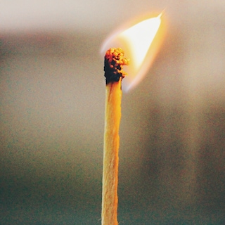 A burning match