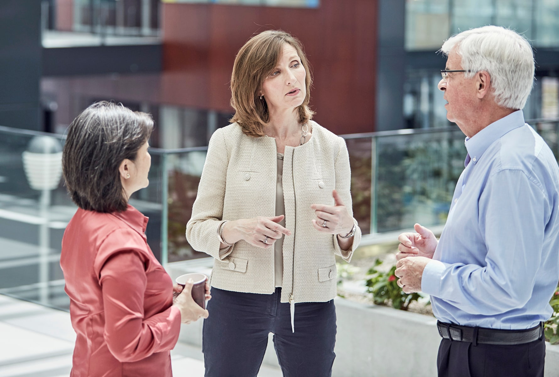 Moira Gilchrist talking to scientists at The Cube Neuchatel