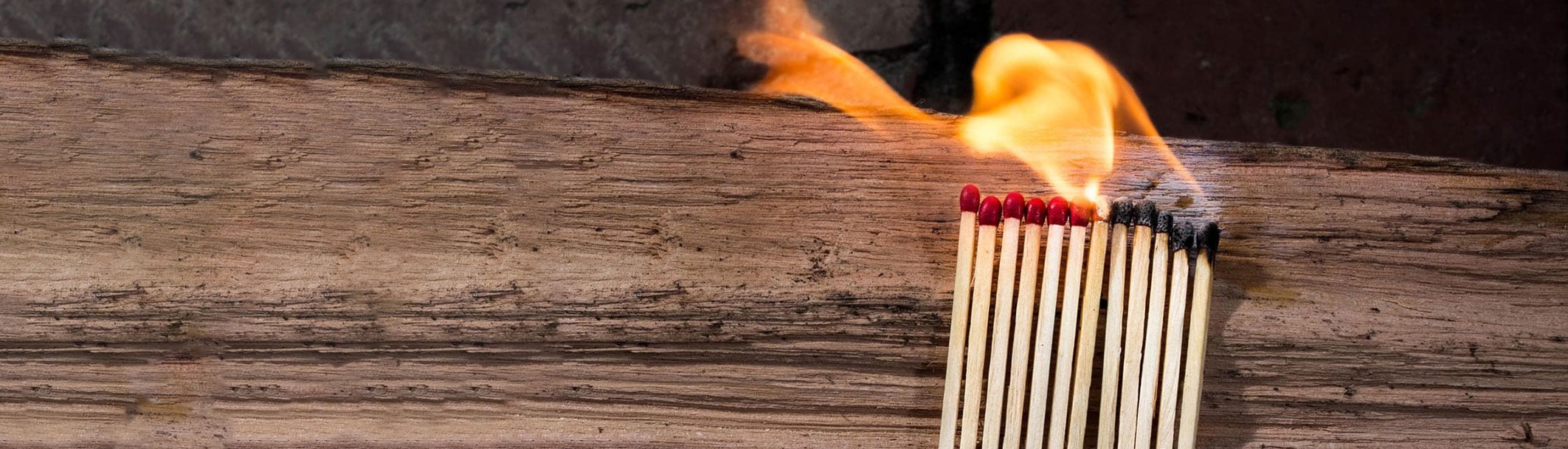 Burning matchsticks on a table