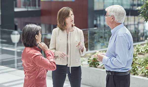 Moira Gilchrist talking to scientists