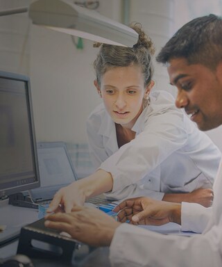 Male and female scientists in a labaratory