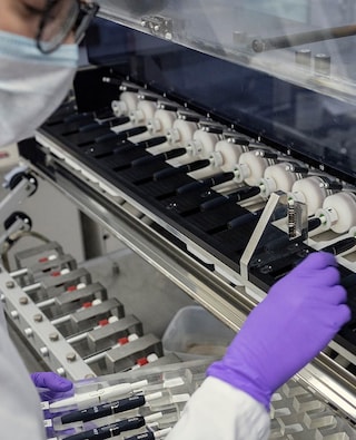 Female scientist in a Philip Morris International laboratory