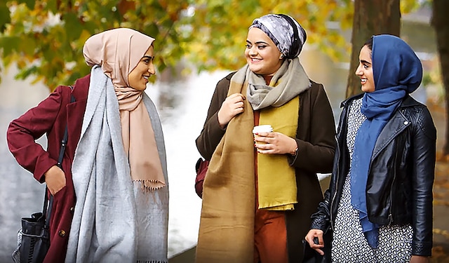 Pakistani women talking outside