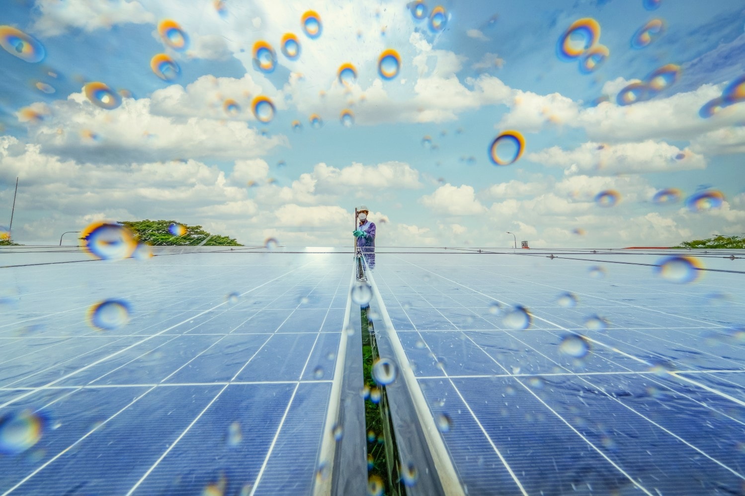 Two solar panels pictured in light rain