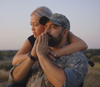 US veteran and partner at dusk