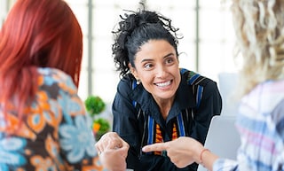 Women talking in an office