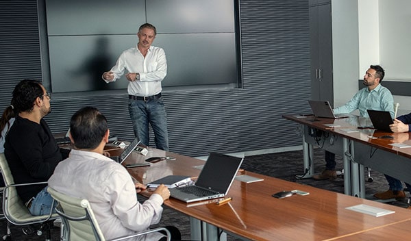 Employees talking in a meeting room