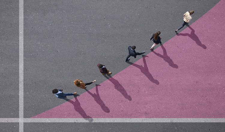 People walking along a line going diagonally upwards