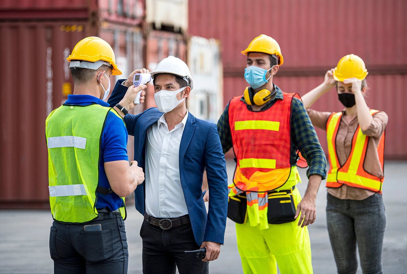 Workers getting temperature readings 1780x1200